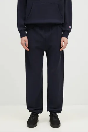 Champion Tepláky Elastic Cuff Pants tmavomodrá barva