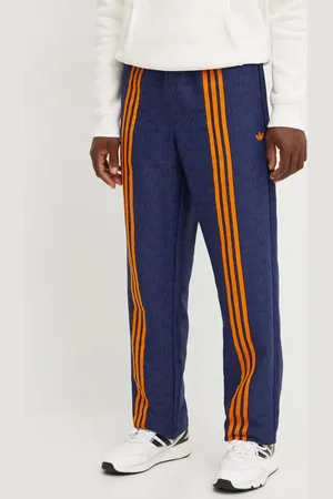 adidas Tepláky Club TrackPant tmavomodrá barva