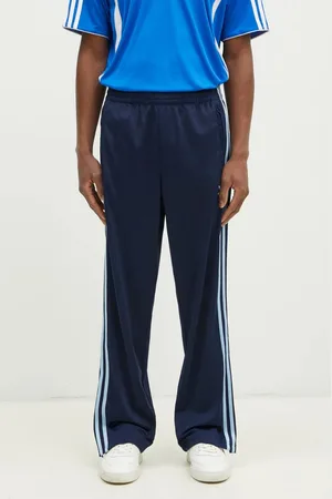 adidas Tepláky Firebird tmavomodrá barva