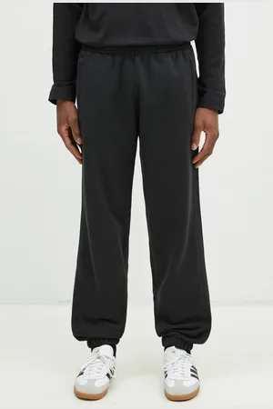 adidas Bavlněné tepláky Essential barva