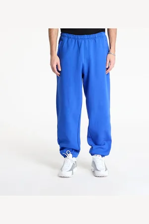 Nike Tepláky ACG Lungs Therma-FIT Repel "Tuff Fleece" Pants Game Royal/ Safety Orange/ Summit White XXS