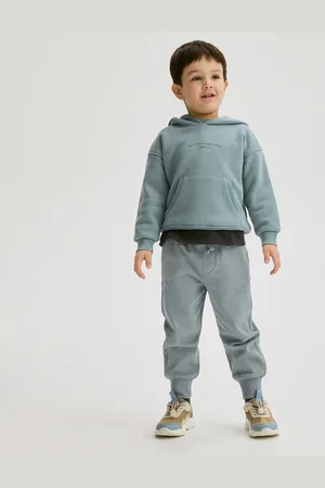 Reserved Bavlněné kalhoty joggers