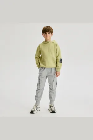 Reserved Kalhoty jogger s kapsami