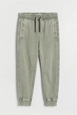 Reserved Bavlněné kalhoty joggers