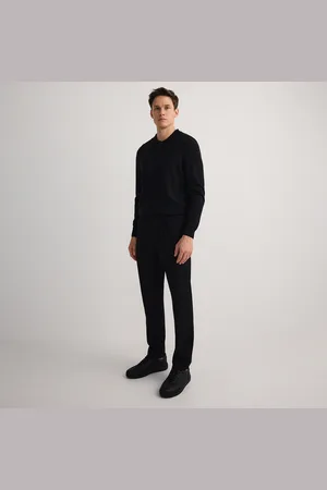 Reserved Kalhoty slim s nažehlenými puky