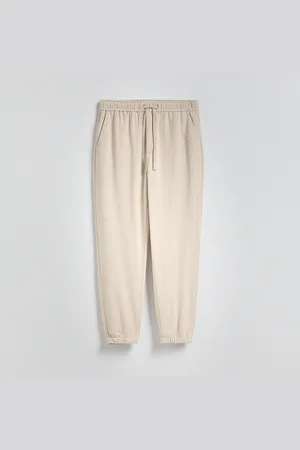 Reserved Kalhoty jogger se lnem