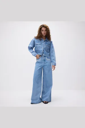 Reserved Džíny wide leg s výšivkou