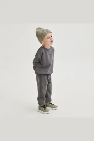 Reserved Bavlněné kalhoty joggers