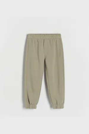 Reserved Bavlněné kalhoty joggers