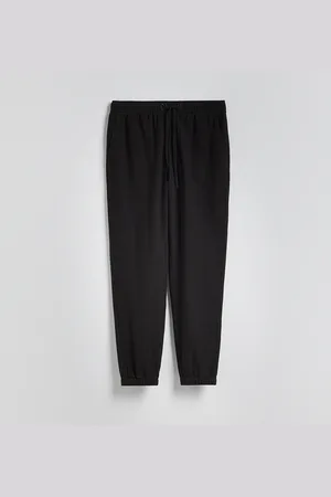 Reserved Kalhoty jogger se lnem