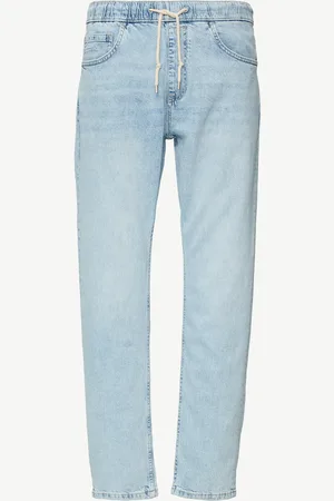QS by s.Oliver Džíny / Regular Fit / Mid Rise / Tapered Leg / směs s lyocellem