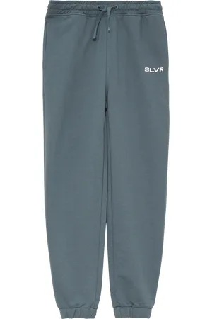QS by s.Oliver Unisex joggingové kalhoty z teplákoviny s natištěným detailem