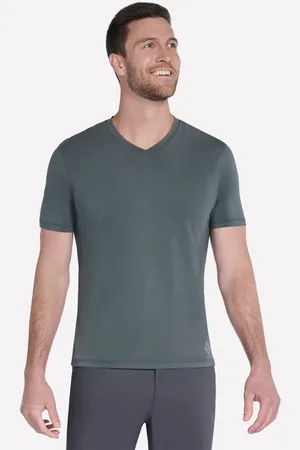 Skechers Muži GO DRI Pima Short Sleeve V-Neck Top v Zelený/Černá