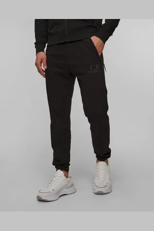 C.P. Company Pánské Tepláky C.p. Company Light Fleece Logo Sweatpants V Černé Barvě