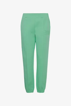 TheJoggConcept Světle zelené dámské tepláky