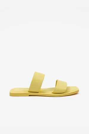 VERO MODA Žluté dámské kožené pantofle Sun Glow