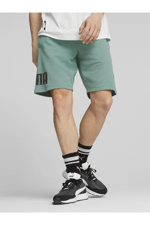 PUMA Světle zelené pánské teplákové kraťasy Power