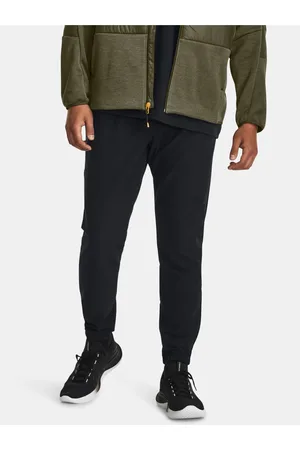 Under Armour Černé sportovní tepláky UA Stretch Woven CW Jogger