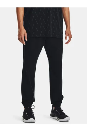 Under Armour Černé sportovní tepláky UA Stretch Woven Joggers