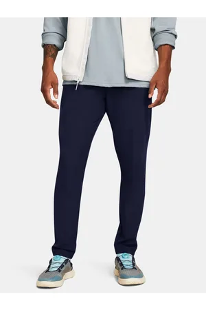 Under Armour Tmavě modré sportovní kalhoty UA UNSTOPPABLE TAPERED PANTS