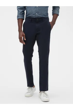 GAP Modré pánské kalhoty essential khakis in skinny fit with Flex